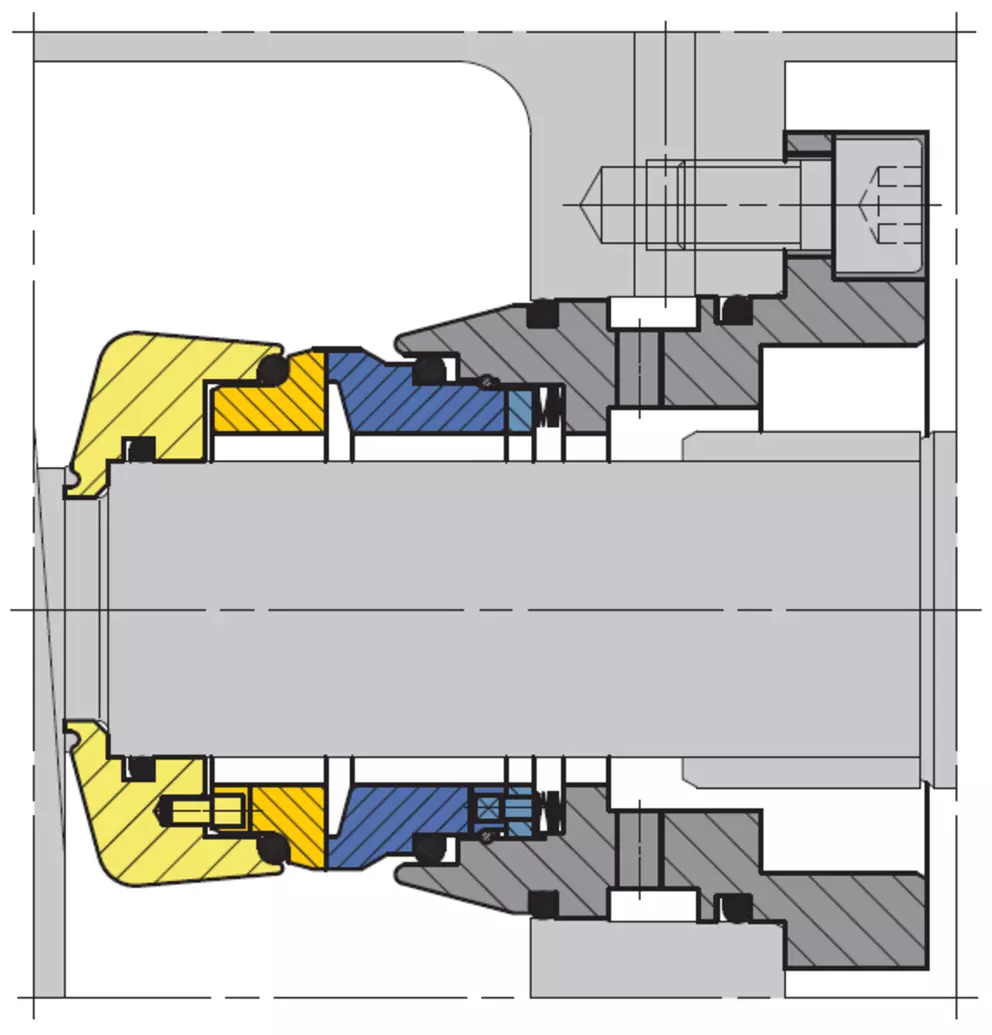 A close-up cross-section engineering diagram of a mechanical seal assembly. It shows a central gray shaft sealed by yellow and blue components within a dark gray housing, detailing the complex internal structure.