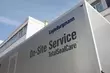 EagleBurgmann On-Site Service TotalSealCare unit outside a company building, emphasizing mobile industrial sealing services and professional field support.