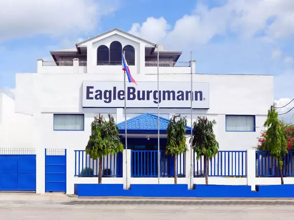 EagleBurgmann office building in the Philippines with prominent company signage, blue fencing, and a clean corporate facade.