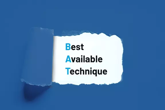 Ripped paper revealing the text 'Best Available Technique (BAT)' on a blue background.
