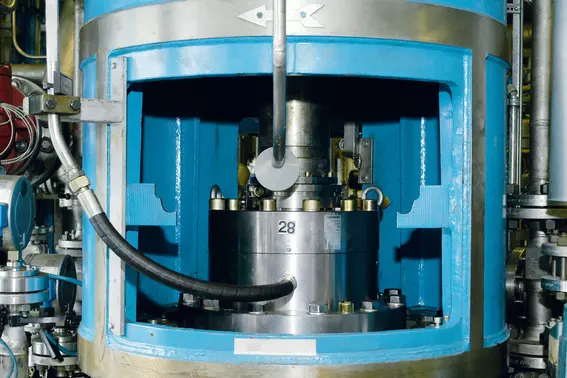 Industrial equipment with an agitator seal and stainless-steel components in a processing plant.