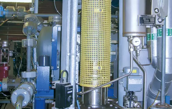Industrial process system with instrumentation, piping, and technical components.