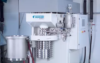 Industrial process machine with stainless steel components and integrated control unit.