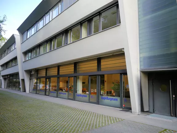Exterior view of the EagleBurgmann office building in Austria, showing the company entrance and modern commercial facade.