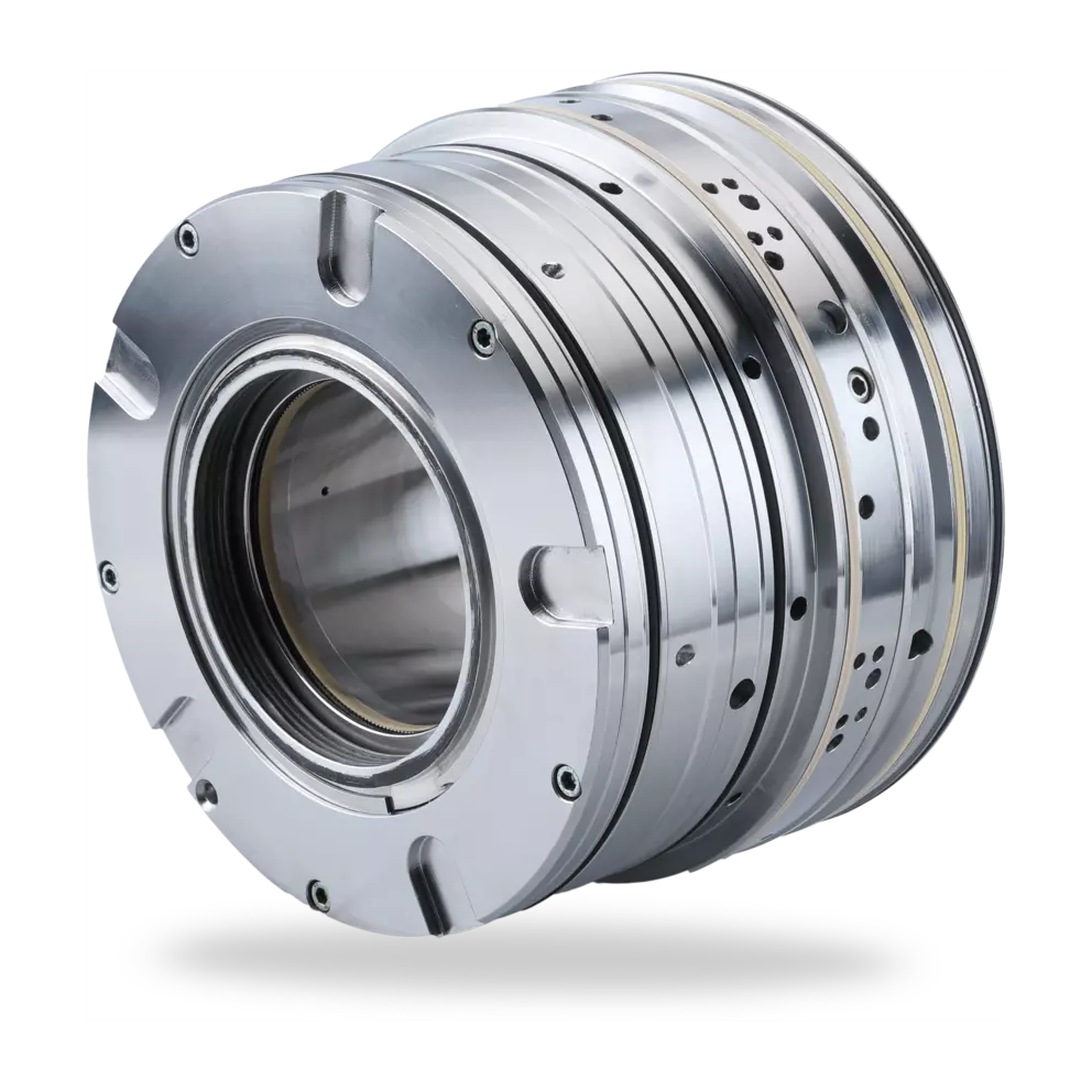 A high-resolution studio shot of a complex, cylindrical, multi-component industrial mechanical seal or cartridge assembly made of polished silver metal.