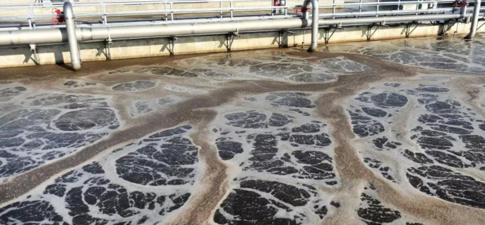 Aeration basin at a wastewater treatment plant during the biological purification process.